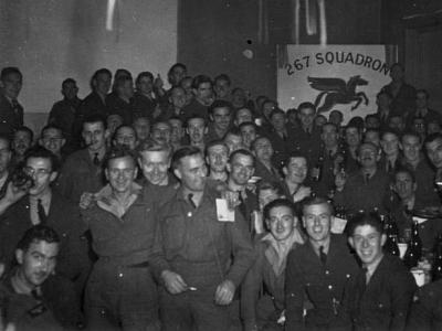 267 Squadron Party, location and date unknown. Ron can be seen on the left about halfway back.