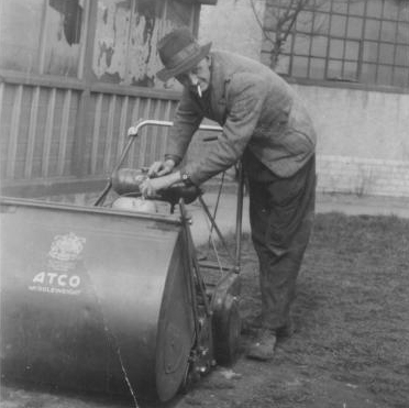Ron's Dad hard at work in his job as a groundsman.
